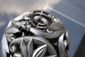 Titanium ring met goud/zilver en zirconia